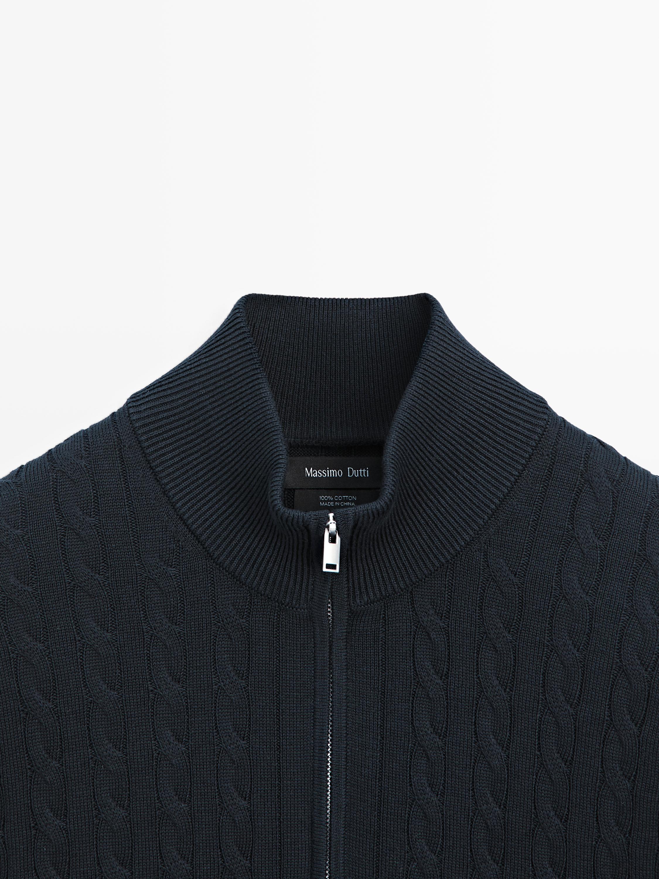 Pull en maille col montant zippé